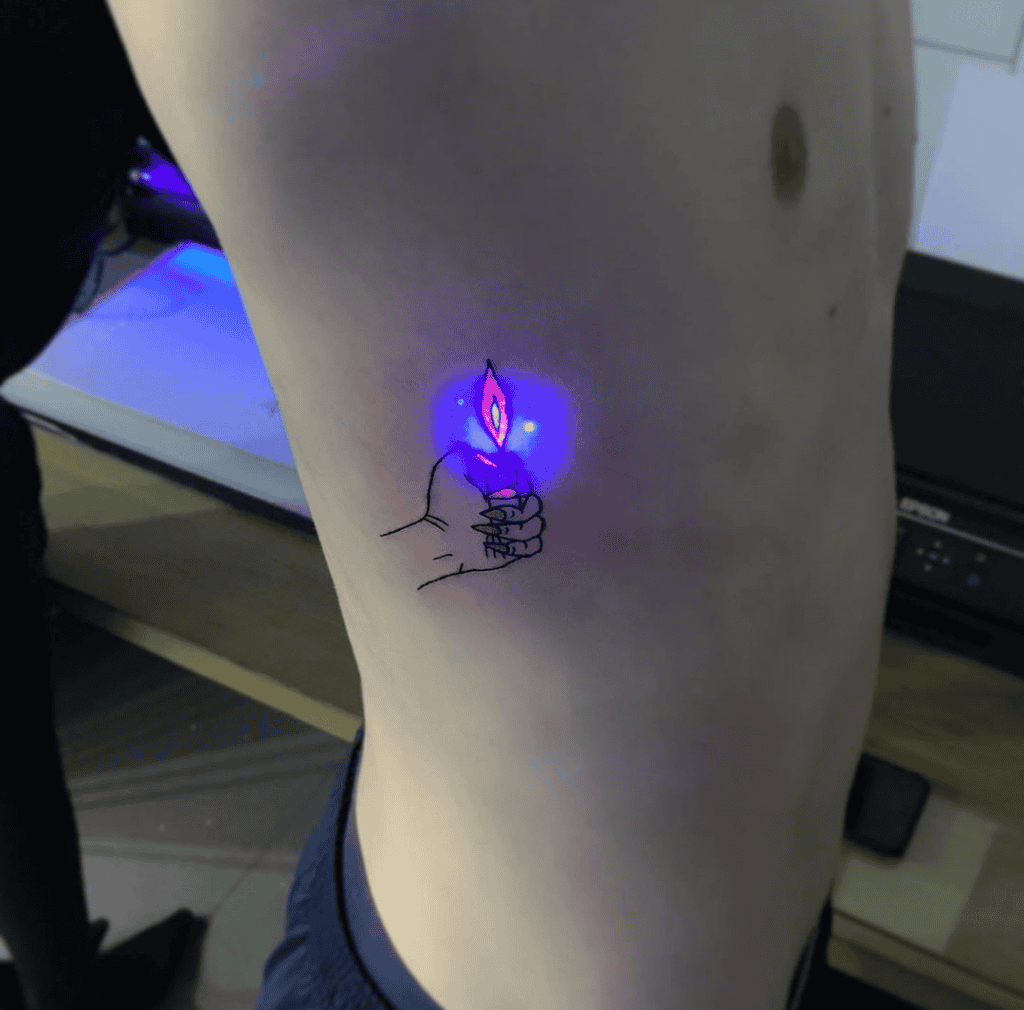 Glow In The Dark Rib Tattoo