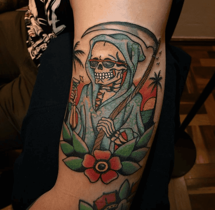 Humorous Grim Reaper Tattoo