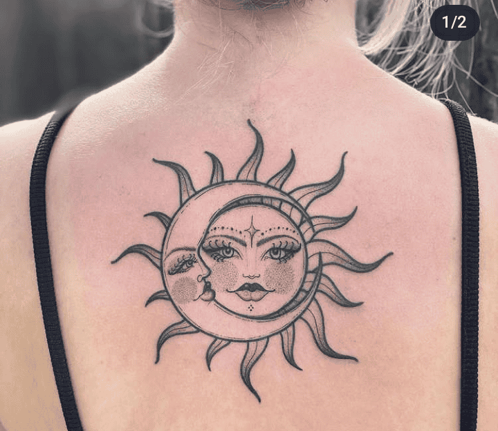 Sun And Moon Faces On Central Upper Back