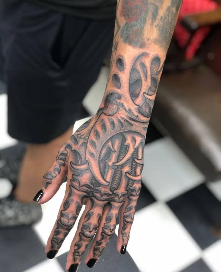 Bio-Bone Skeleton Hand Tattoo