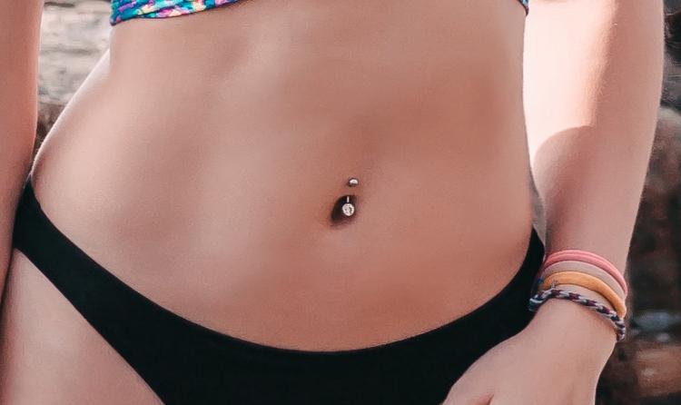 belly-button-piercing-rejection-causes-symptoms-and-how-to-care