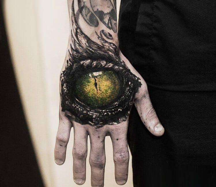 Crocodile Eye on the Hand