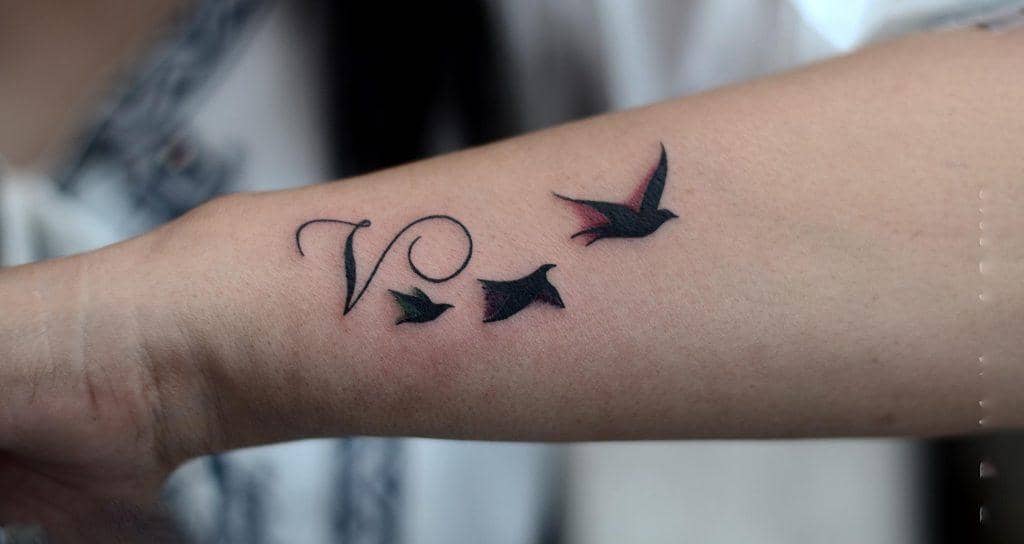 Name Initial With a Bird Tattoo Design