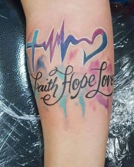 Colorful ‘HOPE’ Script Tattoo
