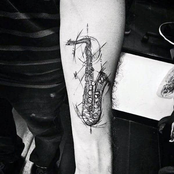 A Tattoo of a Saxophone With Keys