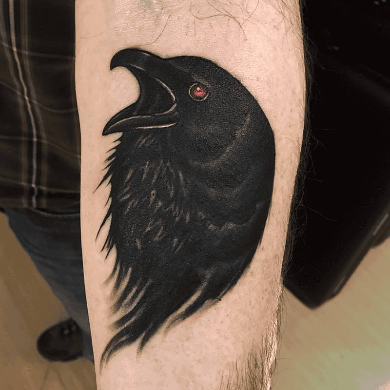 A Design of a Raven With Red Eyes