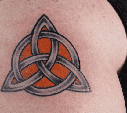 An Intricate Celtic knot With Red Highlights