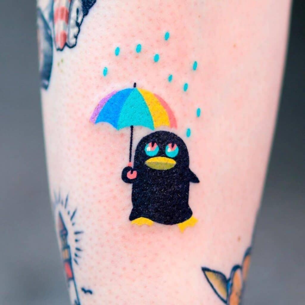 Penguin Holding an Umbrella Tattoo
