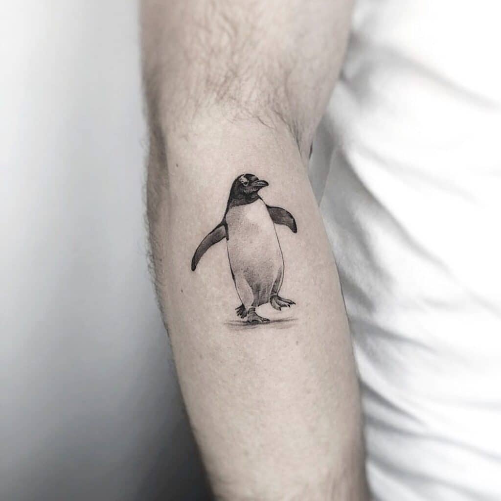 The Penguin With Snowflake Tattoo