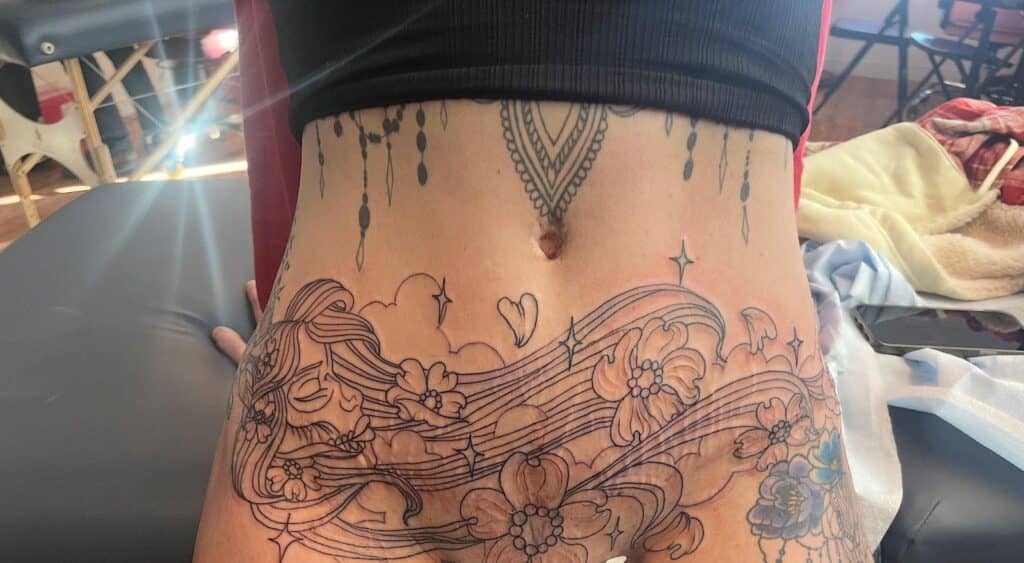 Elaborate Tummy Tuck Tattoo
